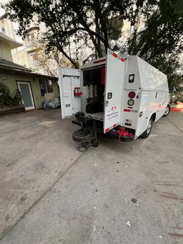 Magnet Plumbing service vehicle on-site for Water Heater Repair in Pinecrest